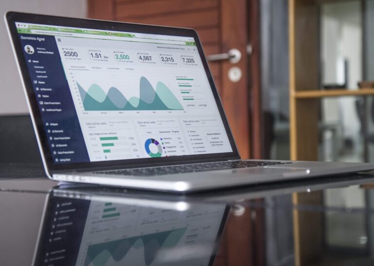 SEO Graphs on laptop that show National SEO Services carried out in the UK